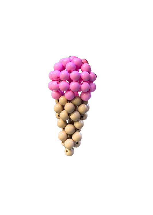 Pink and beige beaded ice cream cone charm on a white background