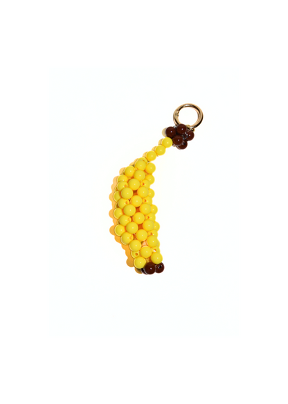 Banana-shaped keychain with yellow beads and brown stem on a white background