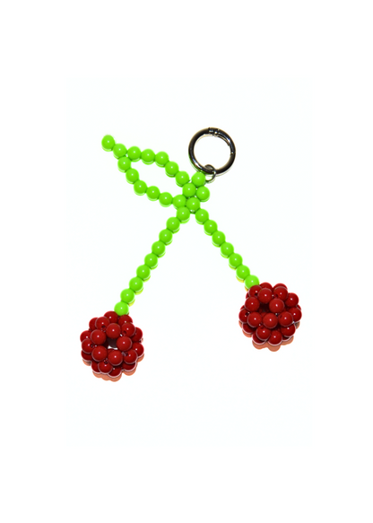 Keychain with green and red beads on a white background